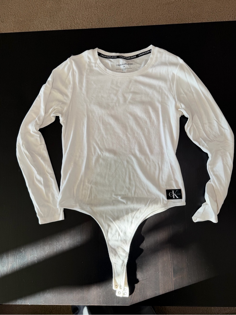Calvin Klein Jeans Women’s White Long-Sleeve Bodysuit with CK Patch